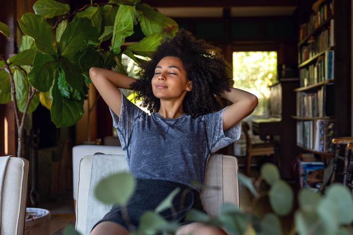 Young woman spending a relaxing day in her beautiful home