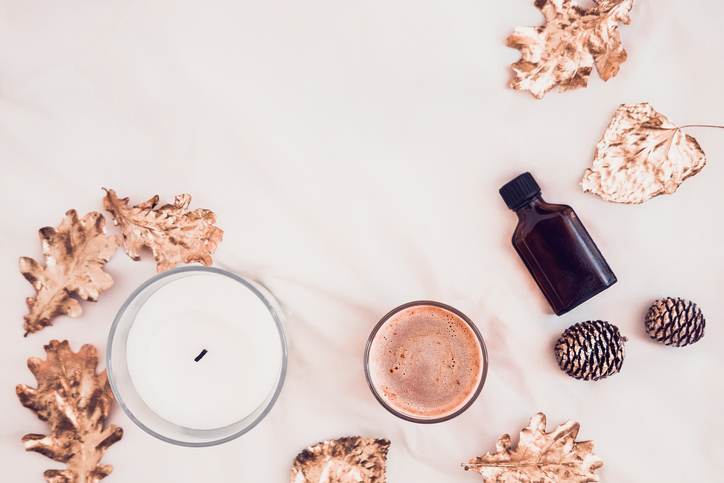 Fall spa beauty products flatlay on white Fall spa beauty products flatlay on white